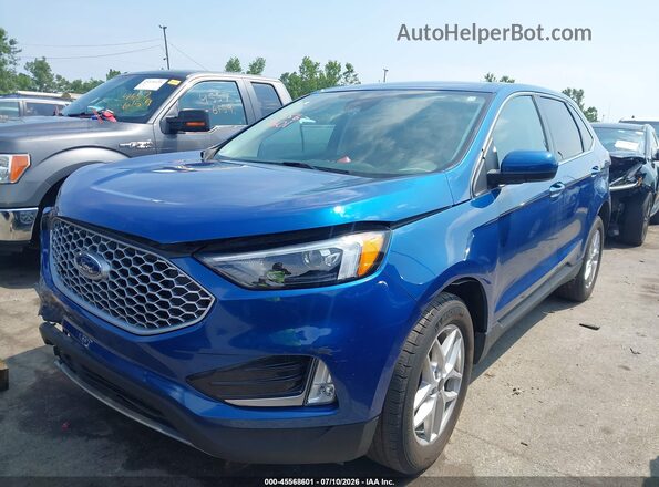 2FMPK4J92RBB07619 2024 FORD EDGE Blue Vista tres cuartos delantera izquierda