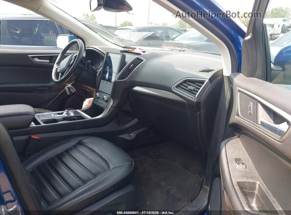 2FMPK4J92RBB07619 2024 FORD EDGE Blue Vista interior delantera