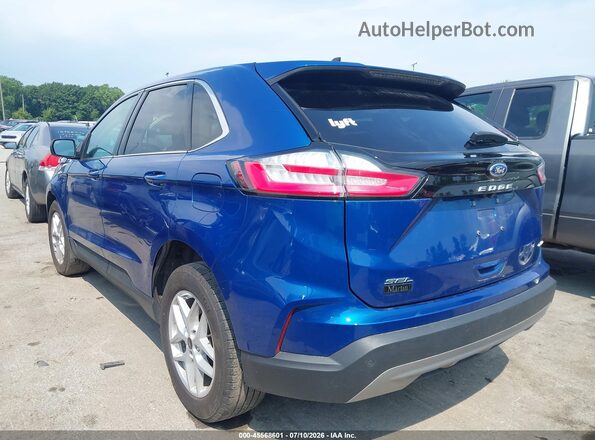 2FMPK4J92RBB07619 2024 FORD EDGE Blue Trasero izquierdo
