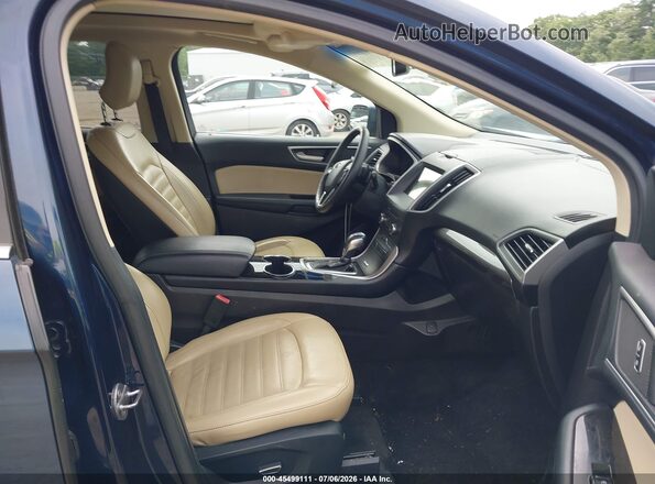 2FMPK4J93HBC40162 2017 FORD EDGE Blue Vista interior delantera