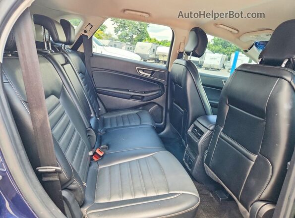2FMPK4J93HBC48665 2017 FORD EDGE Blue Widok wnętrza z tyłu