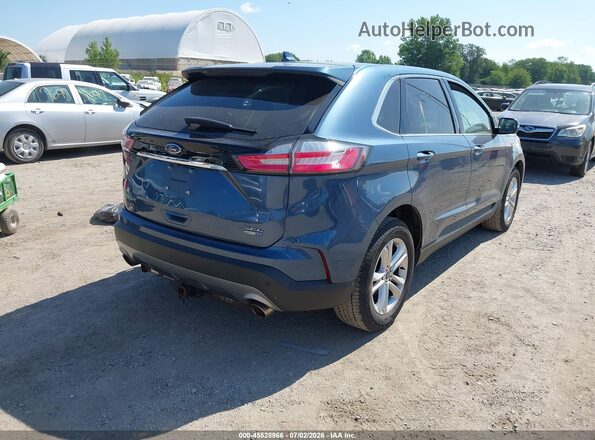 2FMPK4J93KBB76275 2019 FORD EDGE Blue Tył prawy