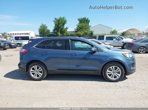 2FMPK4J93KBB76275 2019 FORD EDGE Blue Widok wnętrza z tyłu