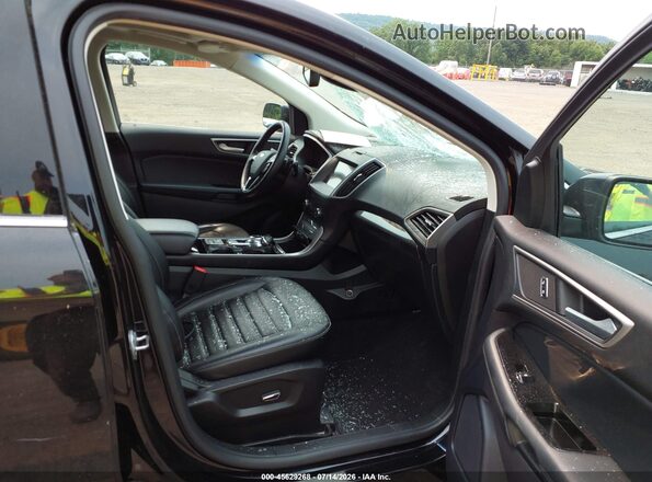 2FMPK4J93KBB99460 2019 FORD EDGE Черный Вид салона спереди