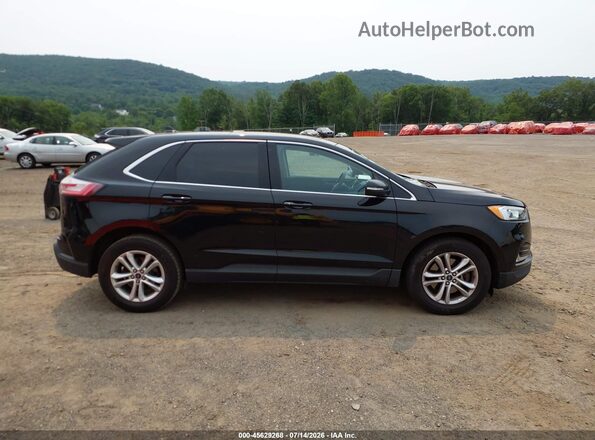 2FMPK4J93KBB99460 2019 FORD EDGE Черный Вид задней части салона