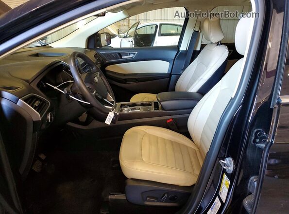 2FMPK4J93PBA55964 2023 FORD EDGE Черный Вид салона спереди