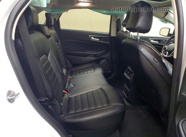 2FMPK4J93RBA97165 2024 FORD EDGE White Вид задньої частини салону