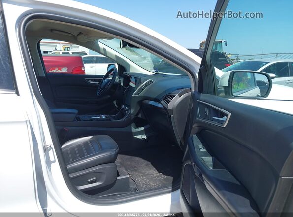 2FMPK4J93RBB00873 2024 FORD EDGE White Вид салону спереду