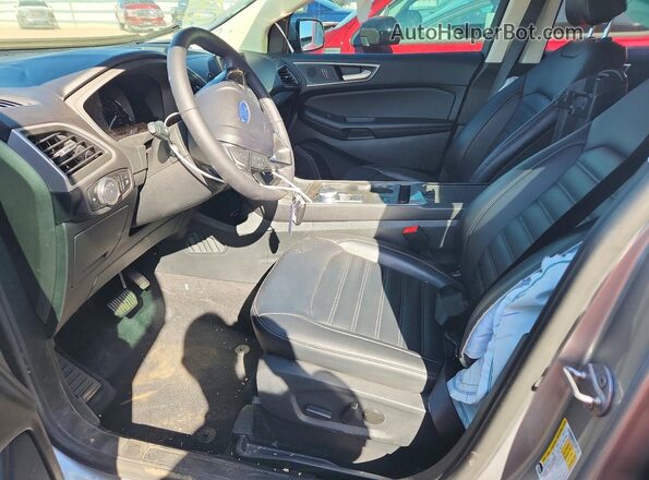 2FMPK4J93RBB15972 2024 FORD EDGE Серебряный Вид салона спереди