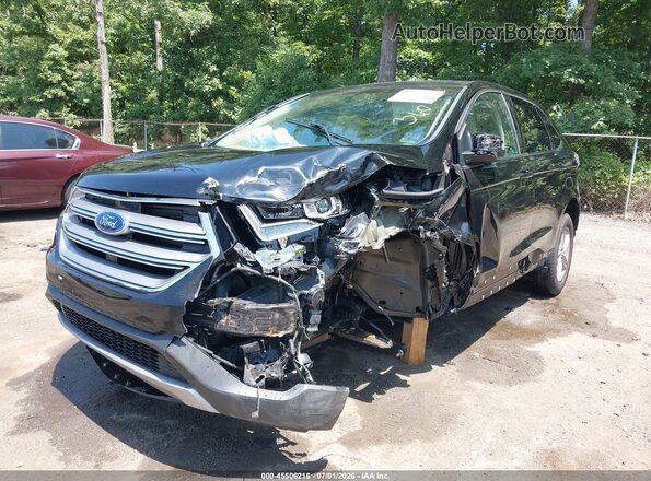 2FMPK4J94GBC16208 2016 FORD EDGE Black Front view