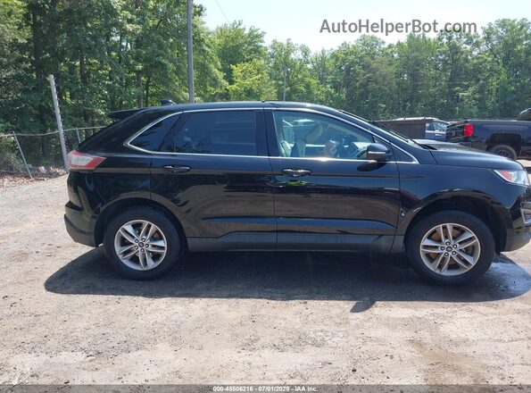 2FMPK4J94GBC16208 2016 FORD EDGE Black Rear interior view