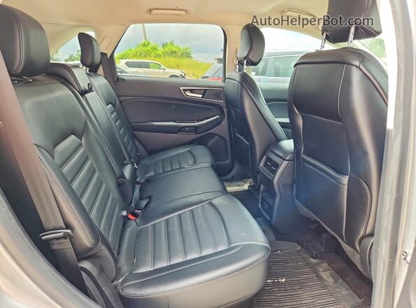 2FMPK4J94JBB78504 2018 FORD EDGE Серебряный Вид задней части салона