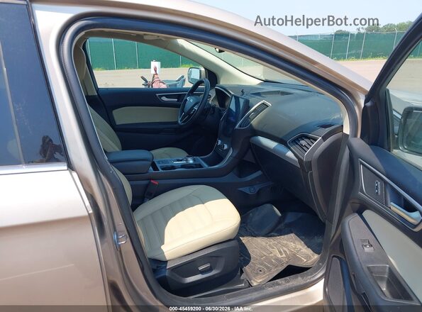 2FMPK4J94MBA59839 2021 FORD EDGE Gold Front interior view