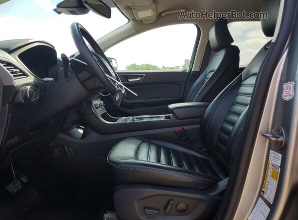 2FMPK4J94RBA67642 2024 FORD EDGE Silver Widok wnętrza z przodu