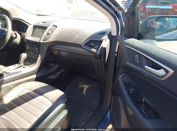 2FMPK4J95JBB53725 2018 FORD EDGE Синий Вид салона спереди
