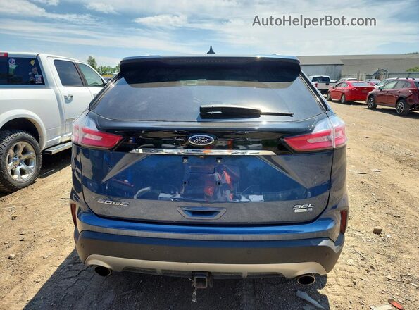 2FMPK4J95KBB87133 2019 FORD EDGE Синий Вид сзади