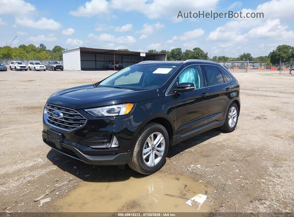 2FMPK4J95LBB40282 2020 FORD EDGE Черный Передняя левая четверть