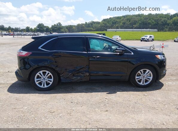 2FMPK4J95LBB40282 2020 FORD EDGE Черный Вид задней части салона