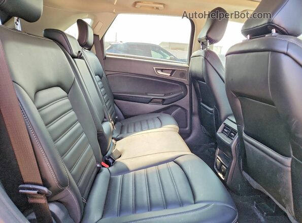 2FMPK4J95LBB59737 2020 FORD EDGE Blue Vista interior trasera