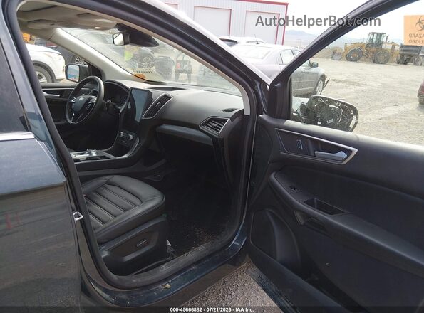 2FMPK4J95NBA04527 2022 FORD EDGE Blue Vista interior delantera