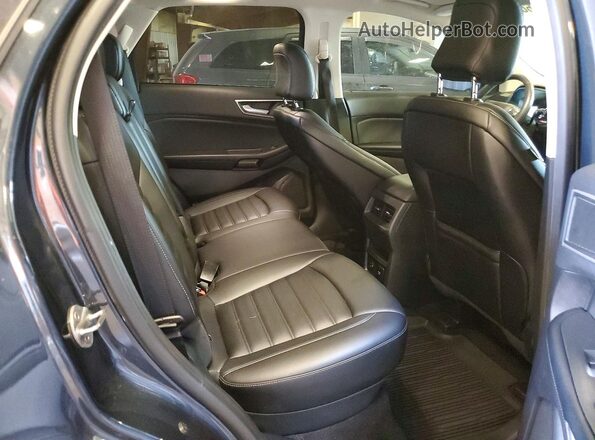 2FMPK4J95NBA41965 2022 FORD EDGE Blue Vista interior trasera