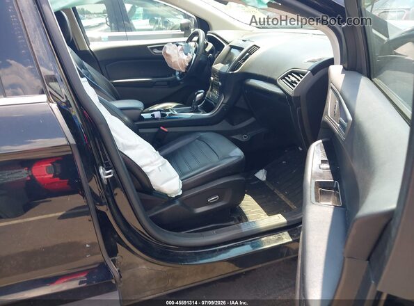 2FMPK4J96JBB62434 2018 FORD EDGE Black Front interior view