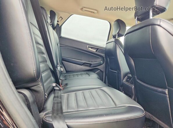2FMPK4J96JBC46673 2018 FORD EDGE Черный Вид задней части салона