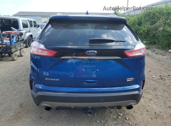 2FMPK4J96LBA76043 2020 FORD EDGE Blue Rear view