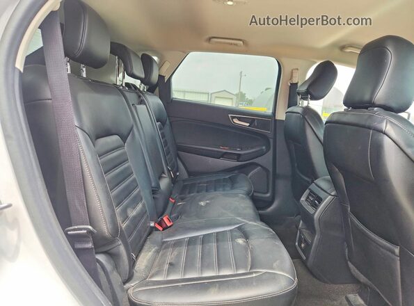 2FMPK4J96LBB11258 2020 FORD EDGE White Rear seats view