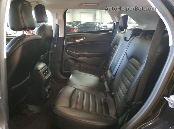 2FMPK4J96LBB43272 2020 FORD EDGE Black Rear seats view