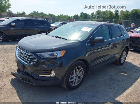 2FMPK4J96MBA11954 2021 FORD EDGE Dark Blue Vista tres cuartos delantera izquierda