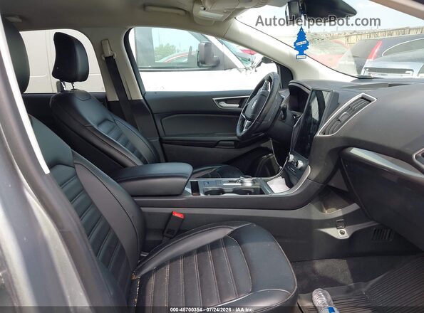 2FMPK4J96PBA54842 2023 FORD EDGE Серебряный Вид салона спереди