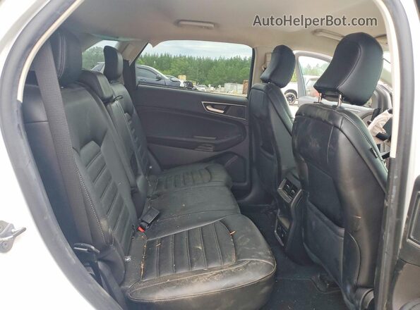 2FMPK4J96RBA34979 2024 FORD EDGE White Vista de los asientos traseros