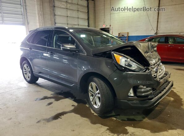 2FMPK4J97KBC46182 2019 FORD EDGE Gray Front right