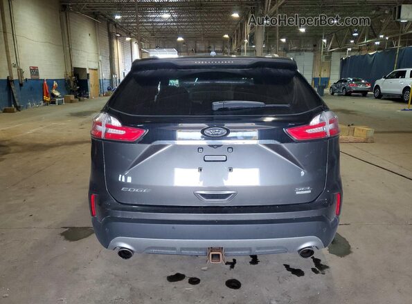 2FMPK4J97KBC46182 2019 FORD EDGE Gray Rear view