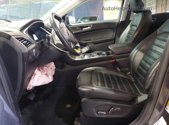 2FMPK4J97KBC46182 2019 FORD EDGE Gray Front interior view