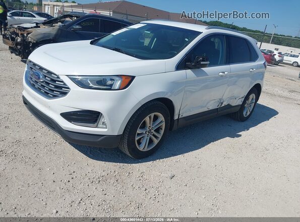 2FMPK4J97KBC60230 2019 FORD EDGE White Vista tres cuartos delantera izquierda