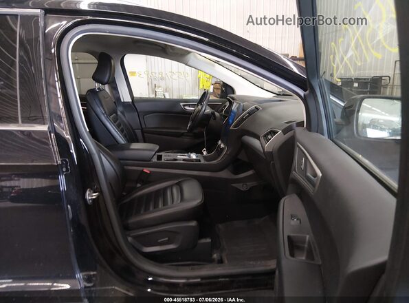 2FMPK4J97MBA25216 2021 FORD EDGE Черный Вид салона спереди