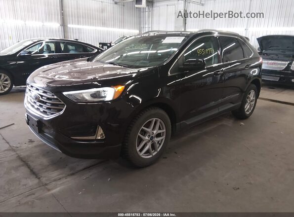 2FMPK4J97MBA25216 2021 FORD EDGE Черный Передняя левая четверть