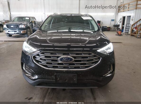 2FMPK4J97MBA25216 2021 FORD EDGE Черный Вид задней части салона