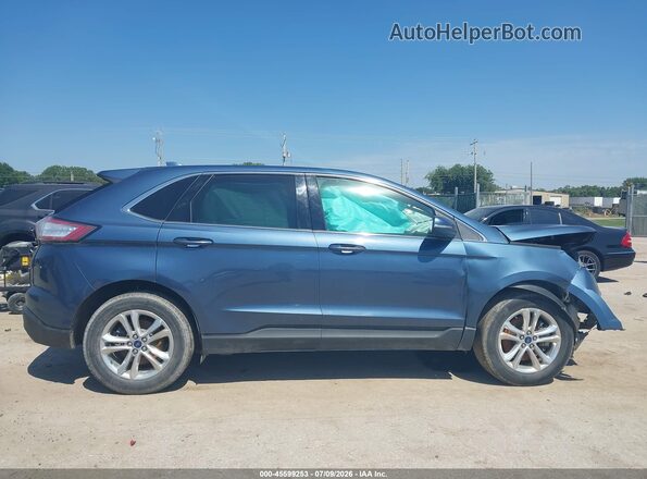 2FMPK4J98JBC51566 2018 FORD EDGE Blue Սալոնի հետևի տեսք