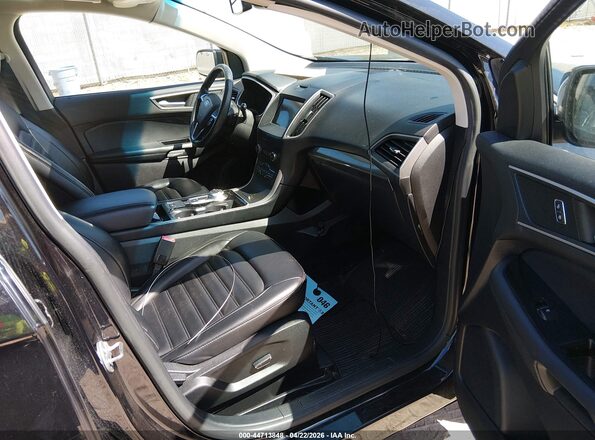 2FMPK4J98KBB40646 2019 FORD EDGE Черный Вид салона спереди