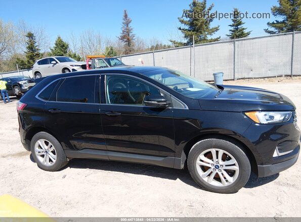 2FMPK4J98KBB40646 2019 FORD EDGE Черный Вид задней части салона
