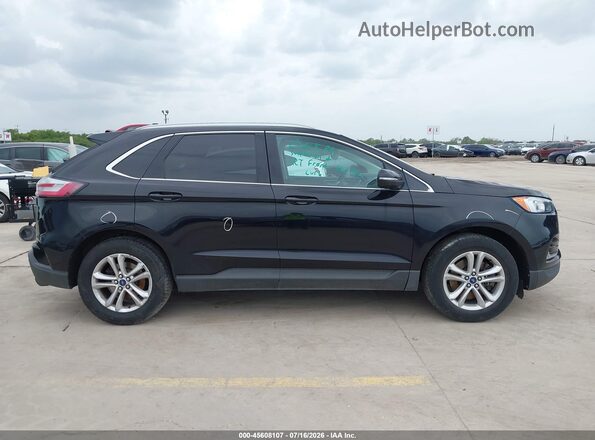 2FMPK4J98KBC24322 2019 FORD EDGE Черный Вид задней части салона
