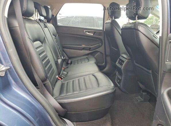 2FMPK4J98KBC26510 2019 FORD EDGE Blue Вид задньої частини салону