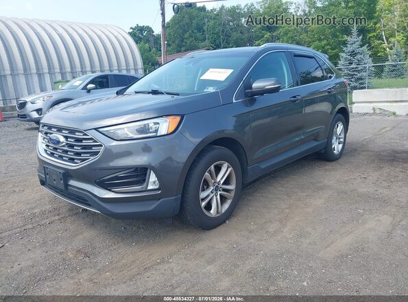 2FMPK4J98KBC31576 2019 FORD EDGE Gray Vista tres cuartos delantera izquierda