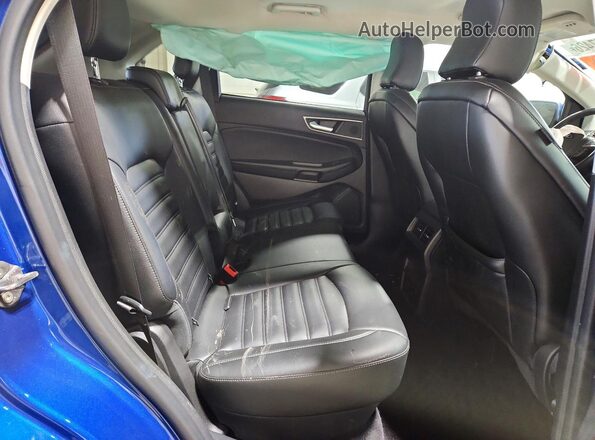 2FMPK4J98PBA23365 2023 FORD EDGE Blue Rear interior view