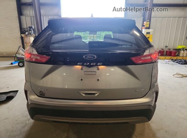2FMPK4J98RBB03882 2024 FORD EDGE Silver Widok z tyłu