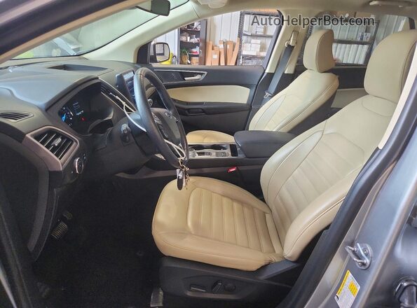 2FMPK4J98RBB03882 2024 FORD EDGE Silver Widok wnętrza z przodu