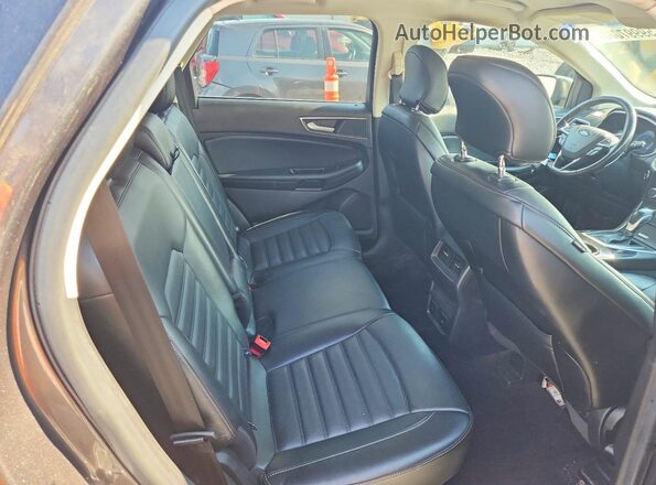 2FMPK4J99GBB70259 2016 FORD EDGE Charcoal უკანა სალონის ხედი